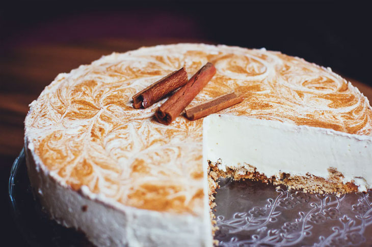 white cheesecake on wooden surface